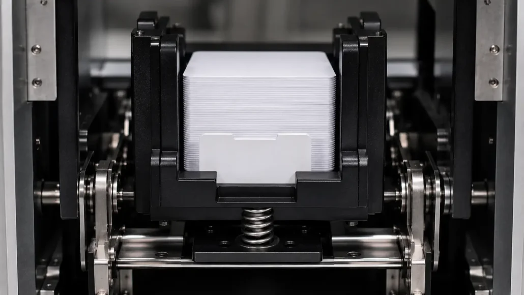 Spring-loaded card hopper mechanism supporting consistent card feeding