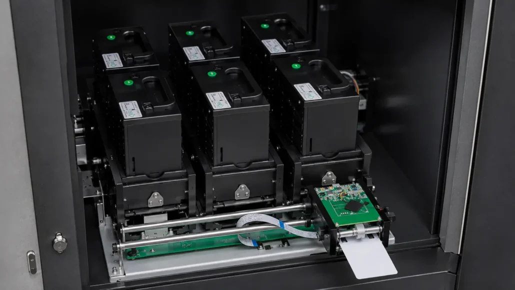 Multi-hopper card dispenser architecture supporting multiple card types in kiosk systems